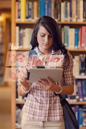 simsearch:400-07057823,k - Cute student working on her digital tablet in a library Foto de stock - Super Valor sin royalties y Suscripción, Código: 400-07057277