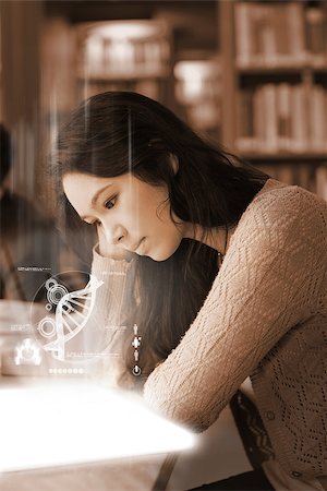 simsearch:400-07138128,k - Student using futuristic hologram to learn biology from tablet sitting in college library Stock Photo - Budget Royalty-Free & Subscription, Code: 400-07057939