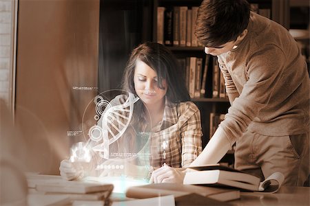 Focused college students analysing dna on digital interface in university library Stock Photo - Budget Royalty-Free & Subscription, Code: 400-07057930