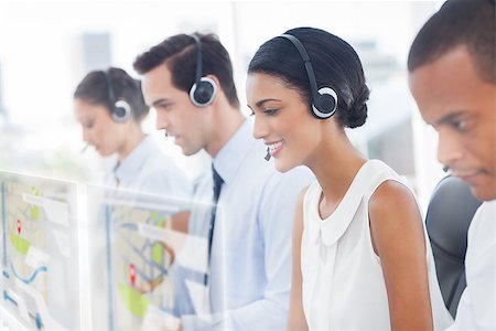 simsearch:400-07138128,k - Call center employees at work on futuristic hologram interfaces in bright modern office Stock Photo - Budget Royalty-Free & Subscription, Code: 400-07057949