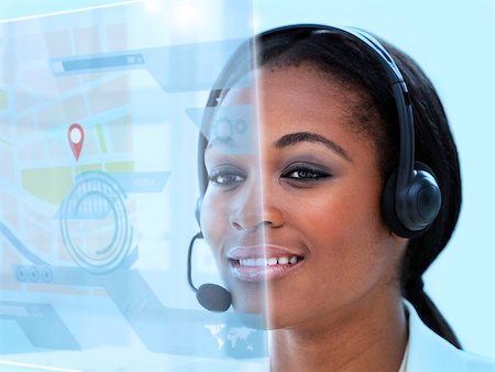 simsearch:400-07138128,k - Beautiful call center worker using futuristic holographic interface while on a call in the office Stock Photo - Budget Royalty-Free & Subscription, Code: 400-07057962