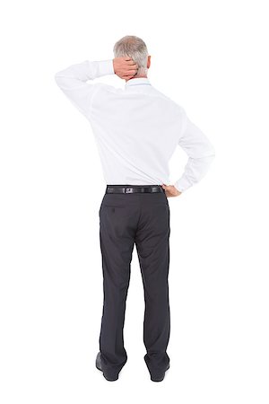 Businessman standing back to camera scratching his head on white background Photographie de stock - Aubaine LD & Abonnement, Code: 400-07058221