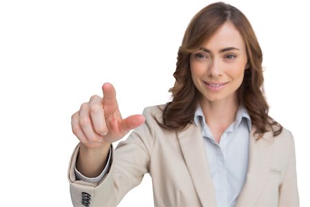 simsearch:400-06883455,k - Portrait of businesswoman pointing her finger at camera on a white background Photographie de stock - Aubaine LD & Abonnement, Code: 400-07058294