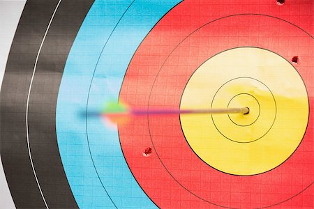 Arrow in bulls eye target blurred from speed Stock Photo - Budget Royalty-Free & Subscription, Code: 400-07058559