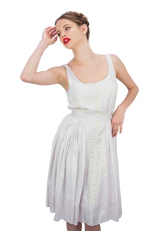 simsearch:400-04204887,k - Attractive model in white dress posing on white background Foto de stock - Super Valor sin royalties y Suscripción, Código: 400-07059862