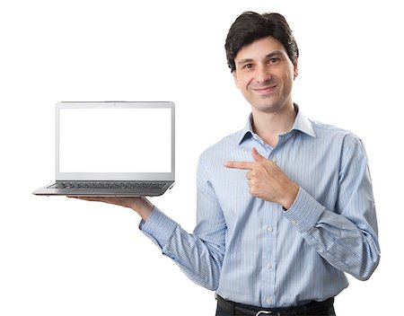 Smiling businessman with laptop computer. Isolated over white background. Stock Photo - Budget Royalty-Free & Subscription, Code: 400-07050029