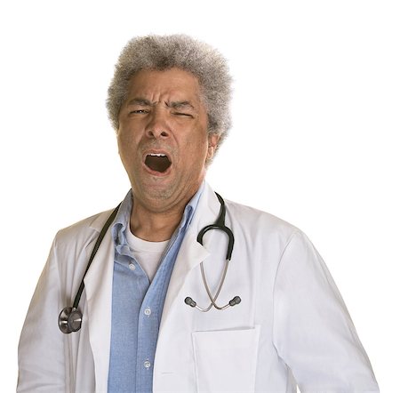 simsearch:400-07042113,k - Yawning Black doctor with stethoscope on white background Stock Photo - Budget Royalty-Free & Subscription, Code: 400-07050214