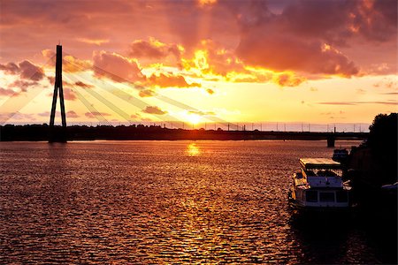 daugava - Sunset on the town river with bridge in Riga, Latvia Stock Photo - Budget Royalty-Free & Subscription, Code: 400-07050280