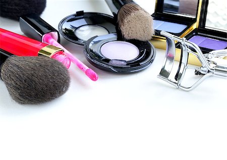 simsearch:400-04172129,k - makeup set (shadows, lipstick, brush) on a white background Stock Photo - Budget Royalty-Free & Subscription, Code: 400-07050565