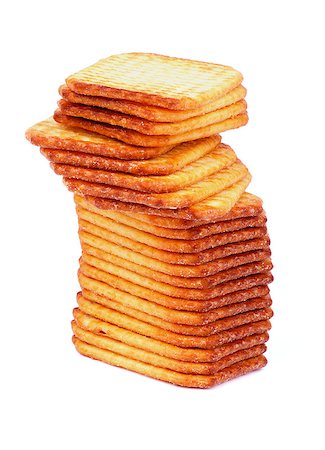 Stack of Crispy Crackers isolated on white background Stock Photo - Budget Royalty-Free & Subscription, Code: 400-07050804
