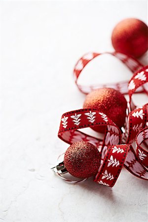 ribbon pattern background - Red gift ribbon and christmas balls on stone background Stock Photo - Budget Royalty-Free & Subscription, Code: 400-07052283