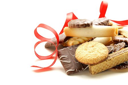 Assorted cookies with chocolate and nuts on  white background Stock Photo - Budget Royalty-Free & Subscription, Code: 400-07052370