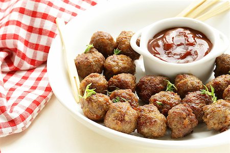 meatballs - traditional meat dish with sauce and herbs Stock Photo - Budget Royalty-Free & Subscription, Code: 400-07052817