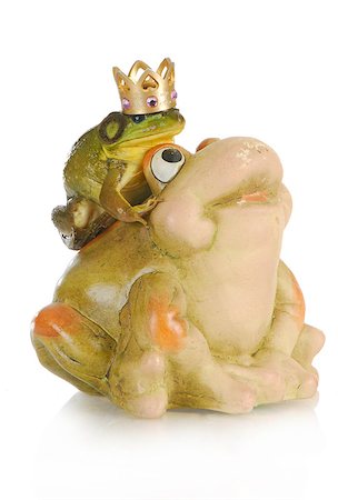 simsearch:400-05333490,k - bullfrog sitting on the back of a ceramic frog isolated on white background Photographie de stock - Aubaine LD & Abonnement, Code: 400-07053200