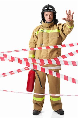 simsearch:640-01358080,k - Mature fireman in uniform on a white background Stock Photo - Budget Royalty-Free & Subscription, Code: 400-07053374