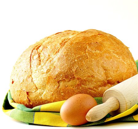 simsearch:400-07996450,k - large loaf of homemade bread with a kitchen towel Foto de stock - Royalty-Free Super Valor e Assinatura, Número: 400-07053491