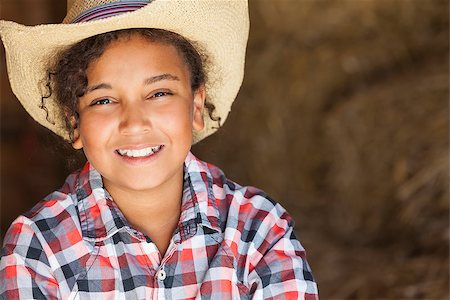 dental pictures black & white - A beautiful and happy mixed race African American female girl child wearing straw cowboy hat and plaid shirt sitting in hay filled barn Stock Photo - Budget Royalty-Free & Subscription, Code: 400-07053737