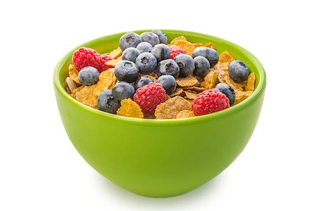 simsearch:400-04416748,k - A bowl of cereal with raspberries and blueberries on a white background Stock Photo - Budget Royalty-Free & Subscription, Code: 400-07053789