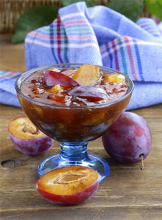 Plum jam in  jar on  wooden table Stock Photo - Budget Royalty-Free & Subscription, Code: 400-07053799