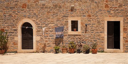 Panorama of inner court of monastery Toplou, Crete, Greece Stock Photo - Budget Royalty-Free & Subscription, Code: 400-07053820