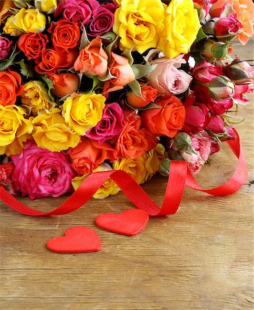 different color roses (yellow, red, pink) may be used as the background Stock Photo - Budget Royalty-Free & Subscription, Code: 400-07060885