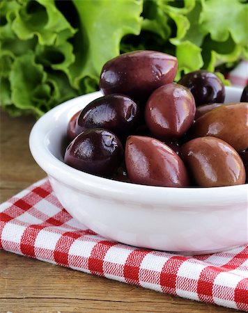 ripe black kalamata olives in a white bowl Stock Photo - Budget Royalty-Free & Subscription, Code: 400-07061203