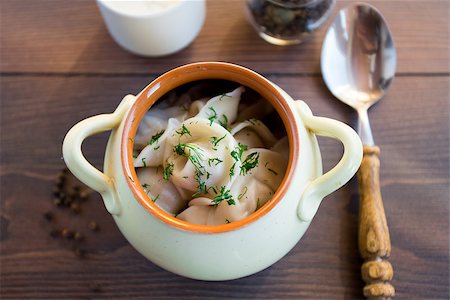 raw chicken dishes - Fresh boiled meat dumplings served with dill in a pot Stock Photo - Budget Royalty-Free & Subscription, Code: 400-07061577