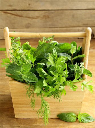 sage flower - various herbs (basil, thyme, parsley, mint and dill) on wooden background Stock Photo - Budget Royalty-Free & Subscription, Code: 400-07061905