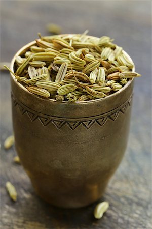 macro shot fennel seeds, aromatic spice seasoning Foto de stock - Super Valor sin royalties y Suscripción, Código: 400-07061908