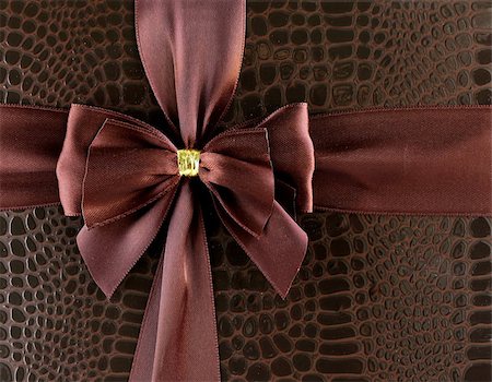 simsearch:400-07248992,k - festive ribbon chocolate color (brown) for background Photographie de stock - Aubaine LD & Abonnement, Code: 400-07061998