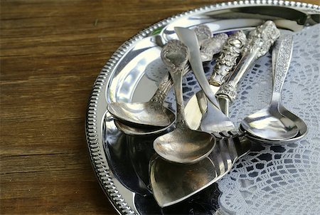 silver antique - vintage cutlery with old-fashioned napkin on a silver tray Stock Photo - Budget Royalty-Free & Subscription, Code: 400-07062201