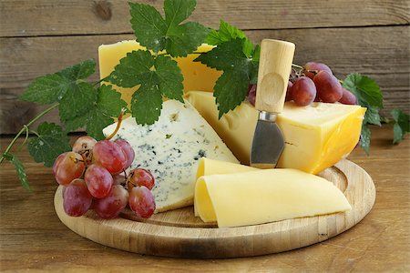 simsearch:400-05682309,k - cheeseboard (Maasdam, Roquefort, Camembert) and grapes for dessert Stock Photo - Budget Royalty-Free & Subscription, Code: 400-07062610