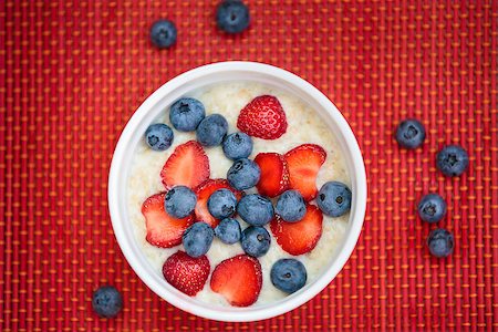porridge and berries - Hot oatmeal breakfast with fresh fruits Stock Photo - Budget Royalty-Free & Subscription, Code: 400-07086925