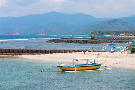 simsearch:400-05892265,k - Traditional fishing boats on a beach in Candidasa on Bali, Indonesia. Stock Photo - Budget Royalty-Free & Subscription, Code: 400-07088205