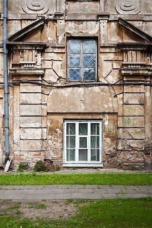 Aged weathered street wall with some windows Stock Photo - Budget Royalty-Free & Subscription, Code: 400-07088575