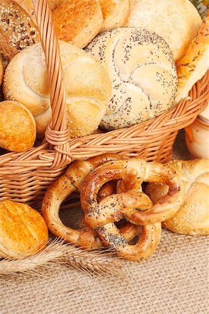 Composition of various baked products in basket on rustic background Stock Photo - Budget Royalty-Free & Subscription, Code: 400-07088688