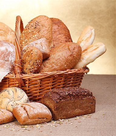 Various breads in basket on canvas tablecloth Stock Photo - Budget Royalty-Free & Subscription, Code: 400-07088701