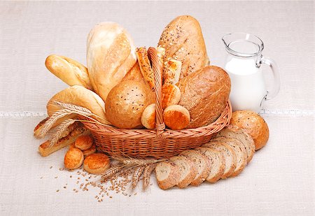 Fresh bread and pastry with milk on jug Stock Photo - Budget Royalty-Free & Subscription, Code: 400-07088732