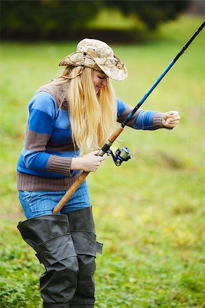 simsearch:400-07501738,k - beautiful blond girl fishing in pond at autumn Photographie de stock - Aubaine LD & Abonnement, Code: 400-07088899