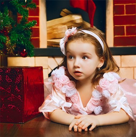 simsearch:400-07088886,k - beautiful little girl lying near christmas tree Stock Photo - Budget Royalty-Free & Subscription, Code: 400-07088893