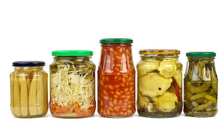 pickling gherkin - Five glass jars with marinated vegetables isolated on the white background Stock Photo - Budget Royalty-Free & Subscription, Code: 400-07089187