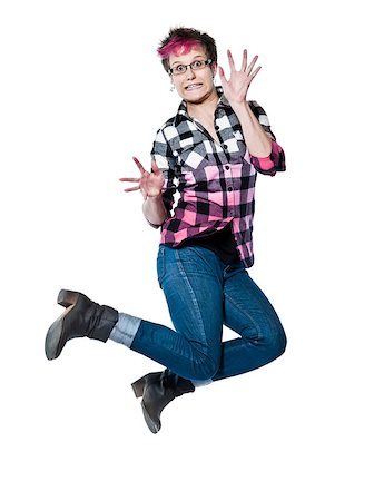 Full length portrait of an extreme nervous woman jumping in studio on white isolated background Stock Photo - Budget Royalty-Free & Subscription, Code: 400-07089831
