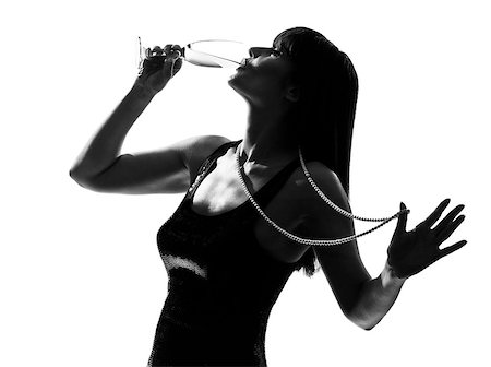 people drinking cocktails silhouette - stylish silhouette caucasian beautiful woman partying drinking champagne flute glass cocktail full length on studio isolated white background Stock Photo - Budget Royalty-Free & Subscription, Code: 400-07089913