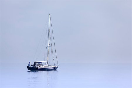 simsearch:632-05759604,k - Lonely yacht in calm blue sea Stock Photo - Budget Royalty-Free & Subscription, Code: 400-07089996