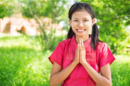 photographic portraits poor people - Portrait of happy smiling beautiful young traditional Myanmar girl in welcoming pose at outdoor. Stock Photo - Budget Royalty-Free & Subscription, Code: 400-07094836