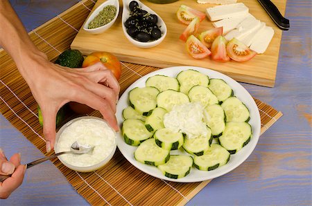 Still life with some staple Mediterranean salad ingredients Stock Photo - Budget Royalty-Free & Subscription, Code: 400-07095352