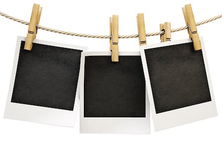 simsearch:400-06463913,k - Photo frames on the rope. isolated on white. Foto de stock - Super Valor sin royalties y Suscripción, Código: 400-07095895