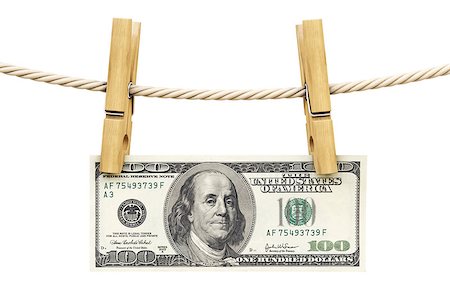 simsearch:693-06021294,k - dollar bill is hanging on a rope with wooden clothespin. isolated on white. Stock Photo - Budget Royalty-Free & Subscription, Code: 400-07095893
