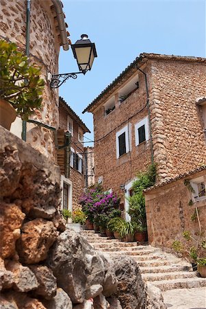 stair for mountain - Narrow street old traditional houses village with flowers, Fornalutx, Majorca island Stock Photo - Budget Royalty-Free & Subscription, Code: 400-07096506