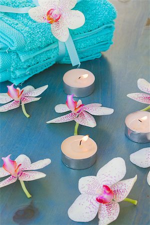 spa treatment  with burning  candles and pink  orchideas Stock Photo - Budget Royalty-Free & Subscription, Code: 400-07097027